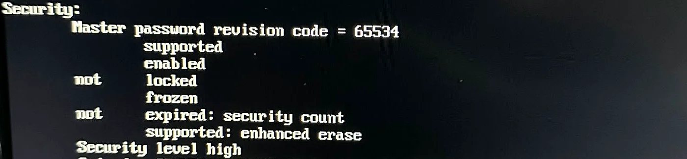 Terminal output of the drive's security status: master password revision code 65534, security supported, enabled, not locked at the time of the capture, frozen, not expired, enhanced erase supported, security level high.